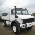 Ex Army Mercedes Unimog U1300L 4x4 Drop Side Cargo Truck Ex Army Mercedes Unimog U1300L 4x4 Drop Side Cargo Truck