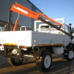 Mercedes Unimog U1300L 4x4 crane truck Mercedes Unimog U1300L 4x4 crane truck