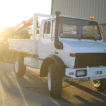 Mercedes Unimog U1300L 4x4 crane truck Mercedes Unimog U1300L 4x4 crane truck