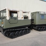 Ex Army Hagglunds BV206 Soft Top All Terrain Vehicle (ATV) Fitted with a Rear Personnel Carrier Body Ex Army Hagglunds BV206 Soft Top All Terrain Vehicle (ATV) Fitted with a Rear Personnel Carrier Body