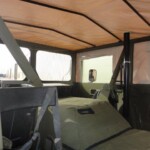 Ex Army Hagglunds BV206 Soft Top All Terrain Vehicle (ATV) Fitted with a Rear Personnel Carrier Body Ex Army Hagglunds BV206 Soft Top All Terrain Vehicle (ATV) Fitted with a Rear Personnel Carrier Body